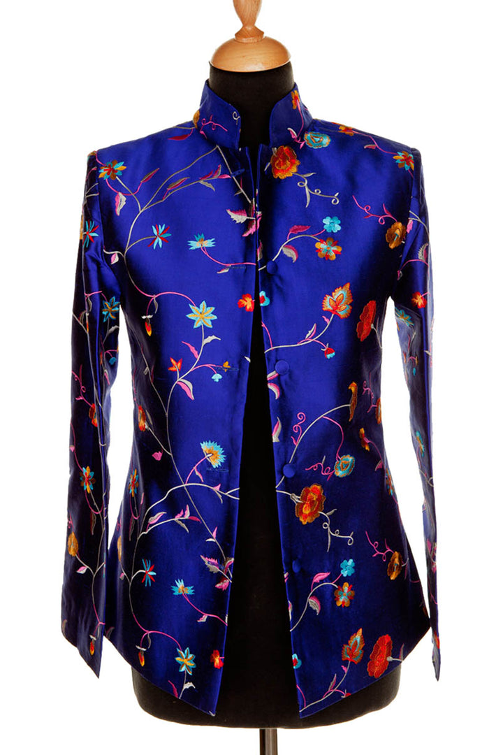 Women's short nehru jacket in blue with floral pattern. 