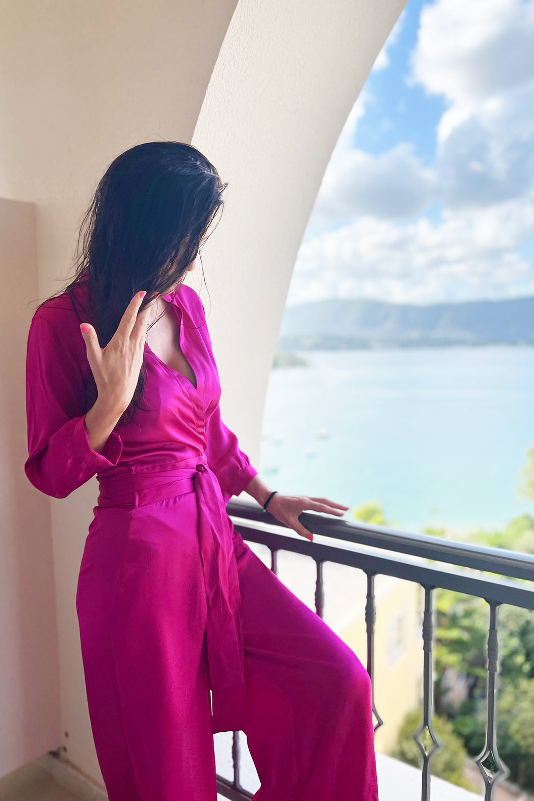 Flattering jumpsuit in pink. Belted holiday jumpsuit. 