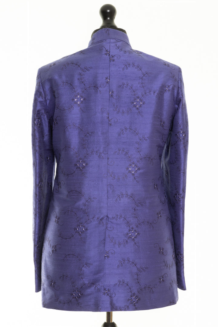 Unique groom's jacket in blue with floral embroidery. This jacket can be made to measure. 