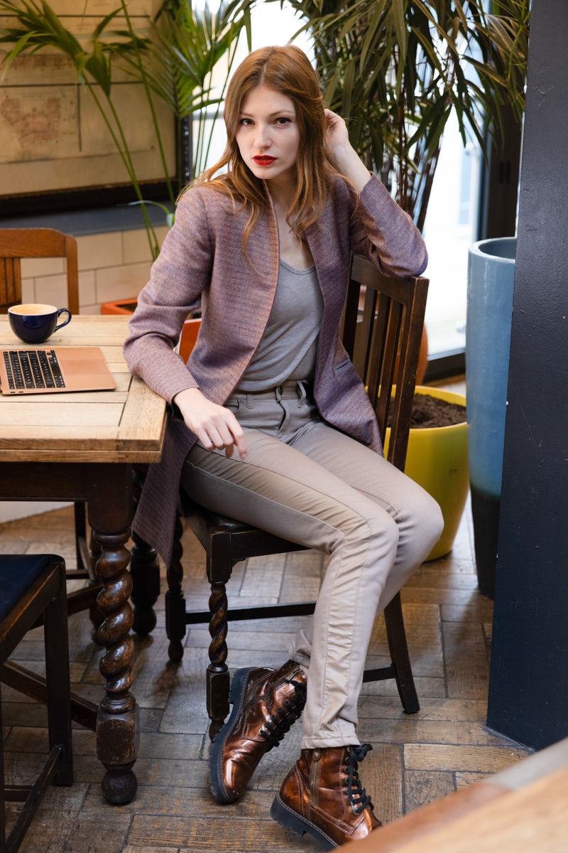 young women wearing long jacket in copper rose colour