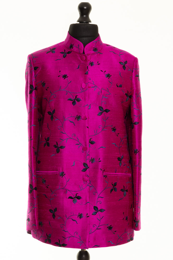 Men's jacket in bright pink with black and blue floral pattern. High collar jacket for men. 