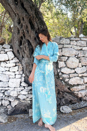 Long blue dress with floral pattern. 