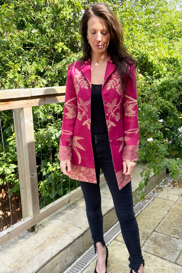 Longline cashmere jacket in red. Floral pattern jacket for women. Pink cashmere with beige pattern. 