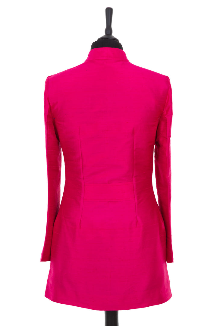 Womens longline jacket with a soft curved collar and half belt in a hot pink plain raw silk, beautiful fitted jacket for weddings 