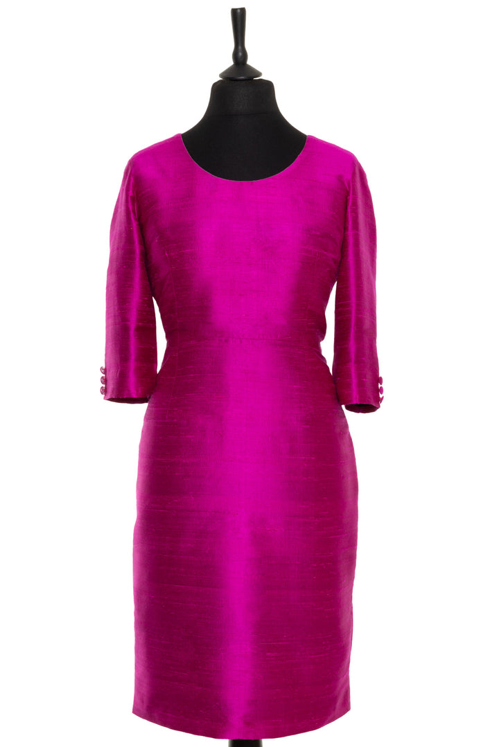 Silk shift dress in bright pink. Elegant fitted around the waistline dress that would make a great dress for mother of the bride or groom. 