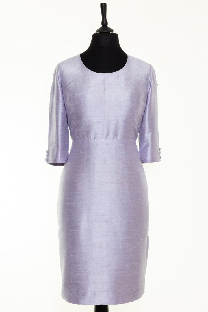 Long sleeve silk dress in lilac. Round neckline shift dress made from raw silk. Knee length dress ideal for ladies over 60. 