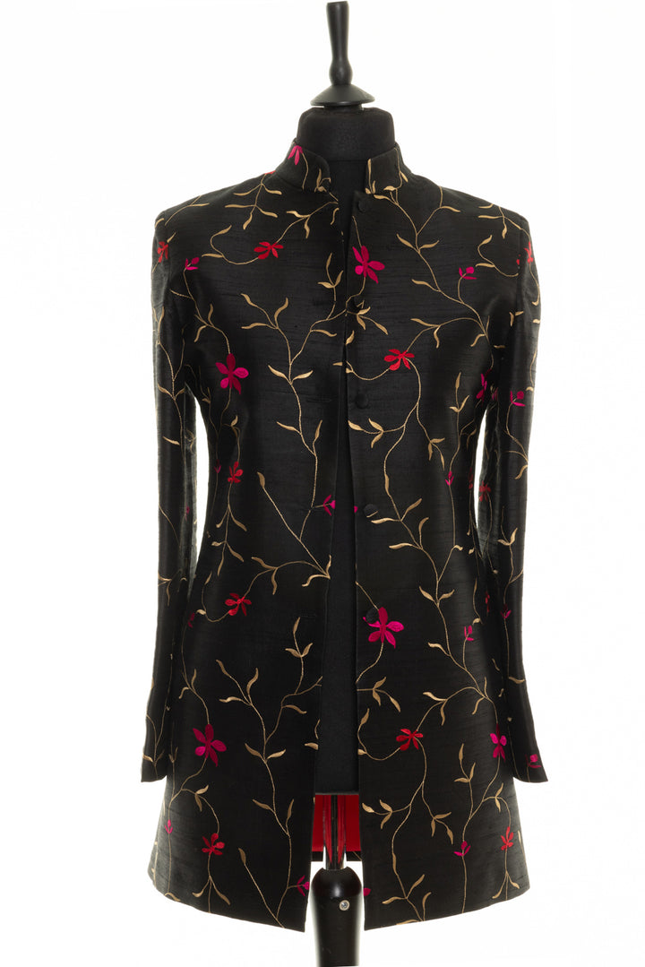 Long women's nehru jacket in black with gold, red and pink embroidery. 