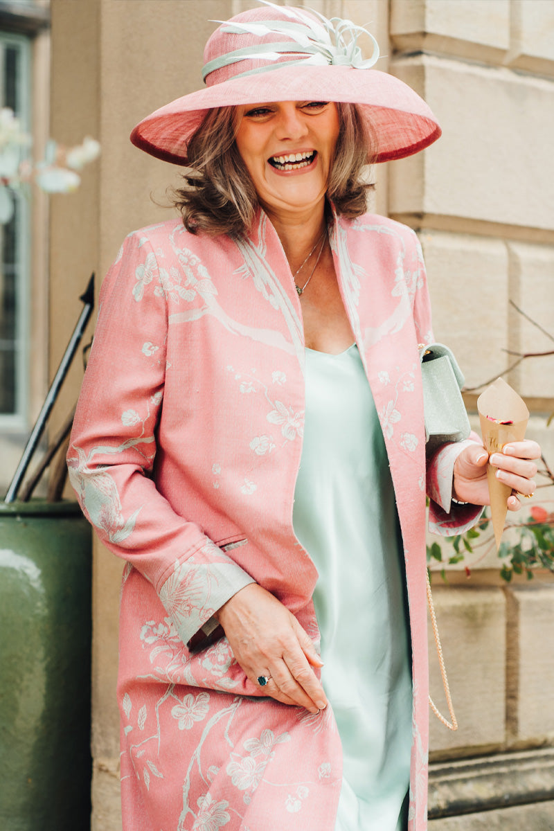 Wedding guest outfit. Women's pink long floral coat. 