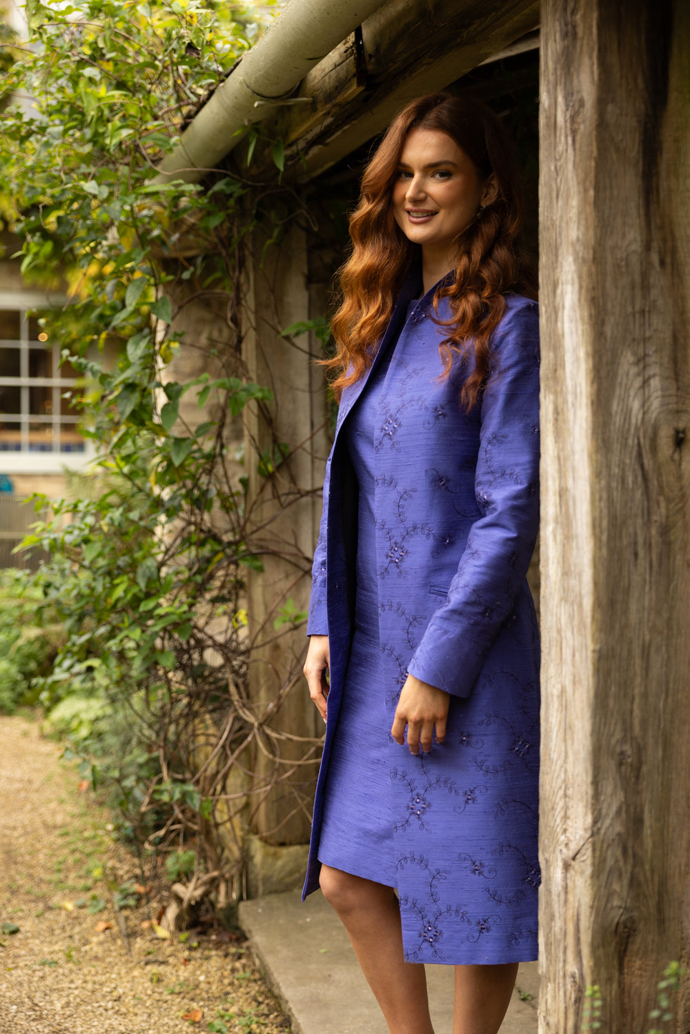 Blue wedding guest outfit. Elegant blue silk coat with floral pattern and high collar. This coat is designed to be worn open. 