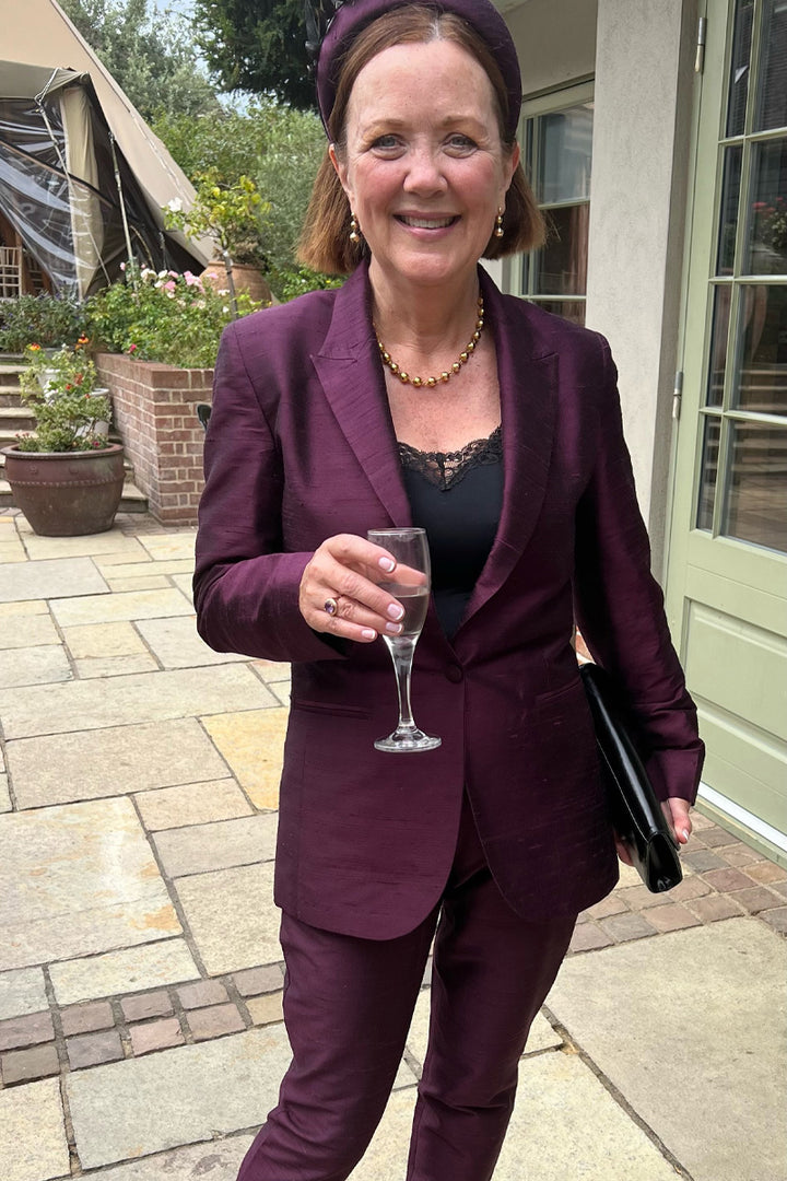 silk purple suit. Women's raw silk aubergine blazer with matching cigarette trousers. Wedding guest outfit. 