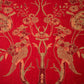 rich red fabric with brown flowers 