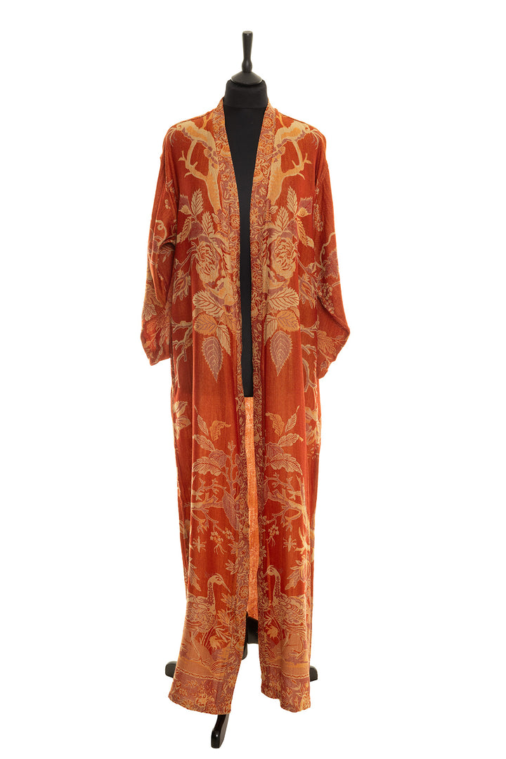 Women's long dressing gown in orange with flowers and birds. 