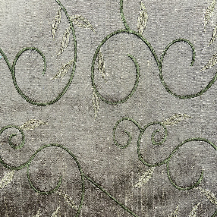 Embroidered raw silk fabric in green. 