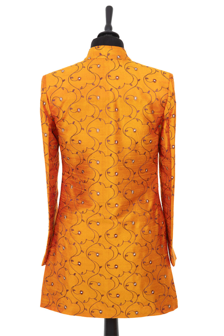 Womens long nehru jacket in a bright yellow embroidered raw silk with a small pattern in burgundy