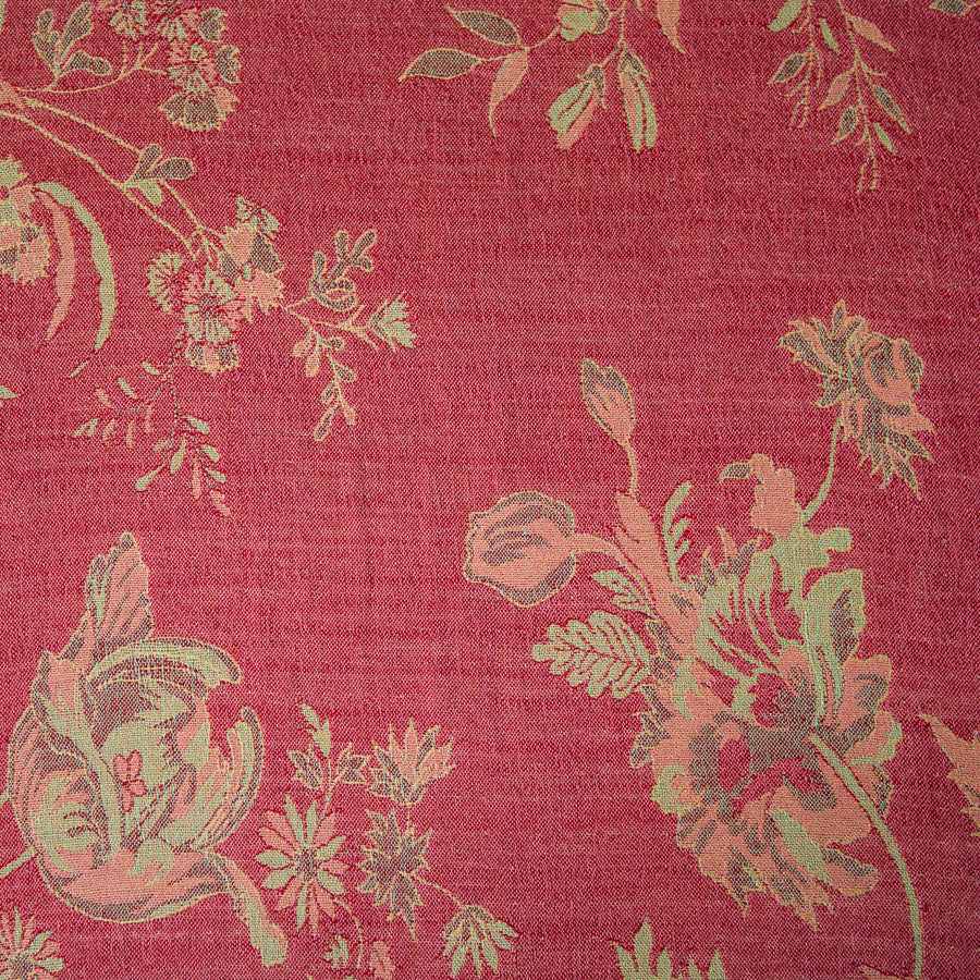 red fabric with green flower pattern 