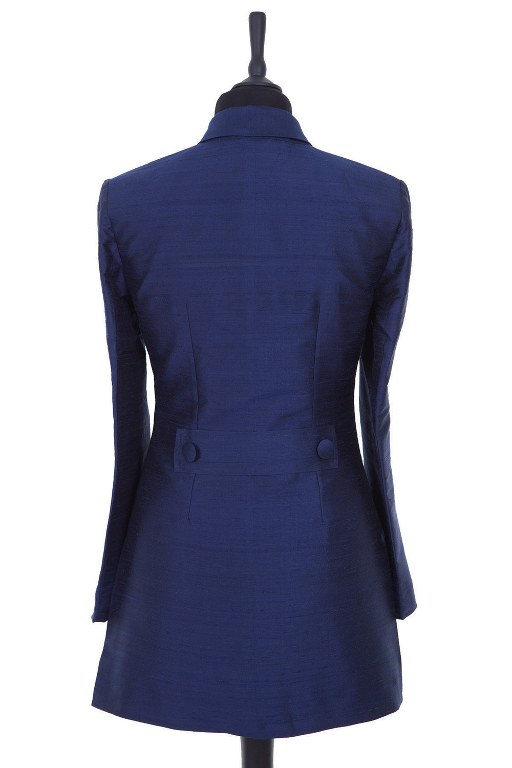 Womens longline blazer style jacket, with vents and revere collar. Shown here in a bright, rich navy blue plain raw silk.