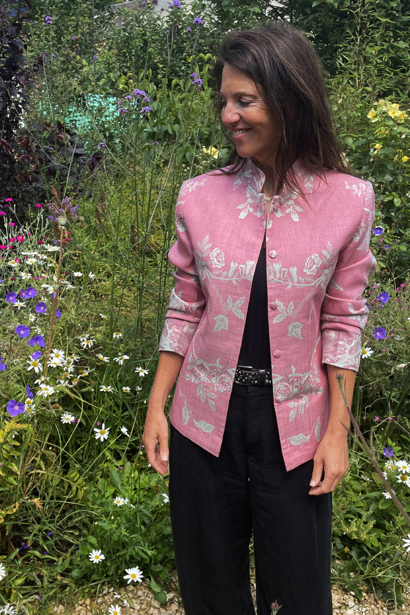 Short pink cashmere jacket for women. Floral pattern jacket.