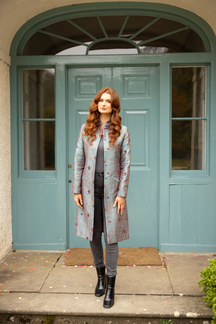 Women's nehru collar silk coat. The colour is smokey blue with floral pattern in yellow and red. Dress coat for weddings. 