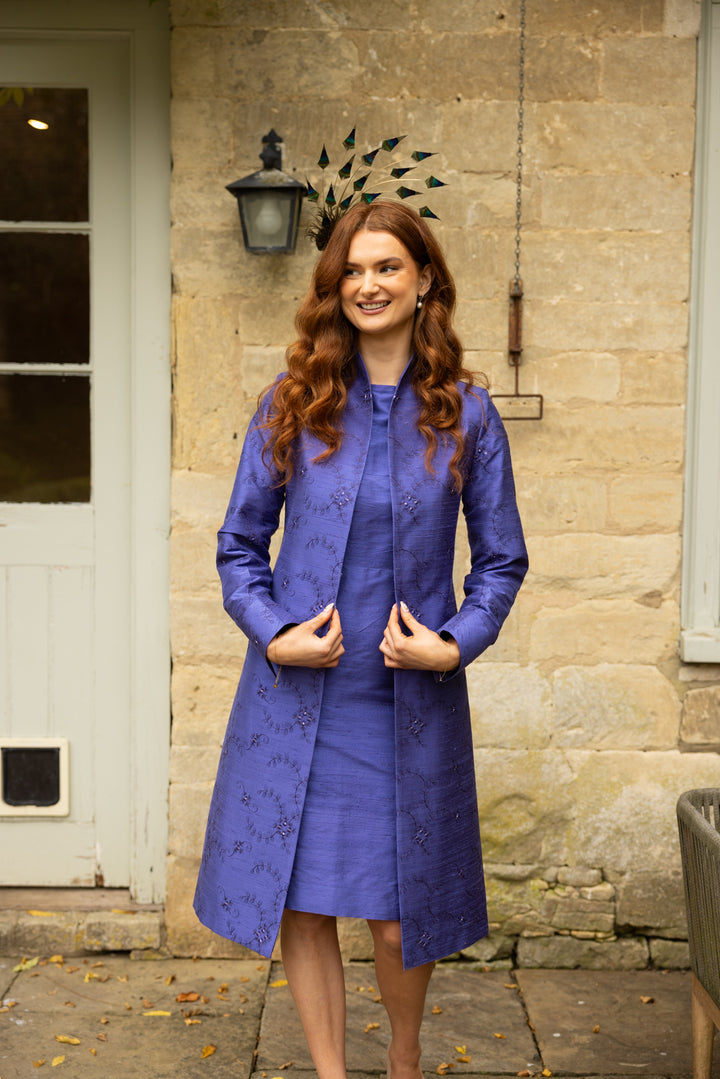 Stunning wedding guest outfit. This blue periwinkle coat is handmade and has embroidered floral pattern. Matched with same colour dress. 