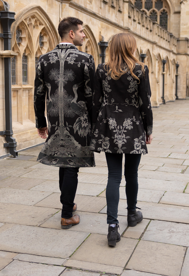 couple wearing beautiful jackets with tree of life pattern 