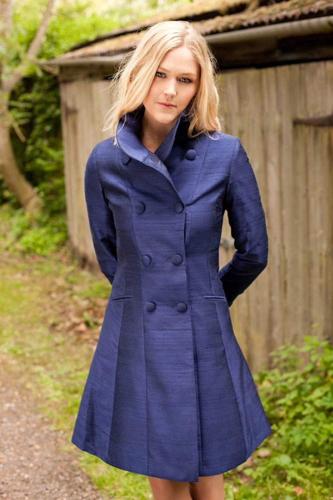 Navy double breasted coat in silk. 