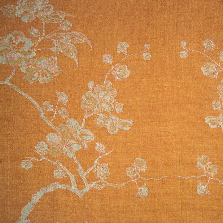 Orange silk fabric with floral pattern