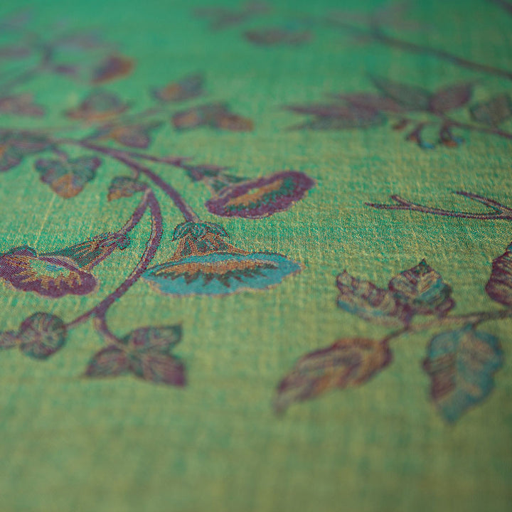 Cashmere green fabric with purple flowers. 