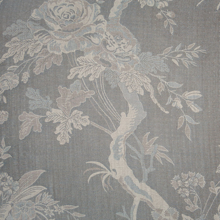 grey fabric with white flower pattern.