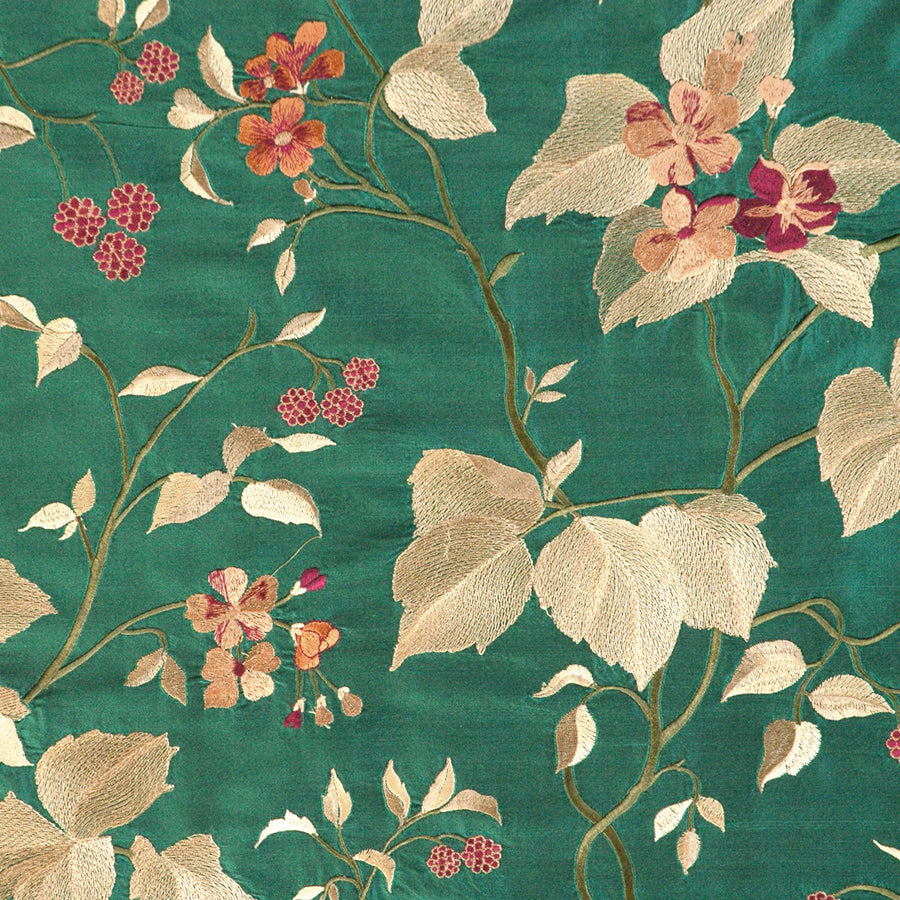 Silk embroidered fabric in green. 