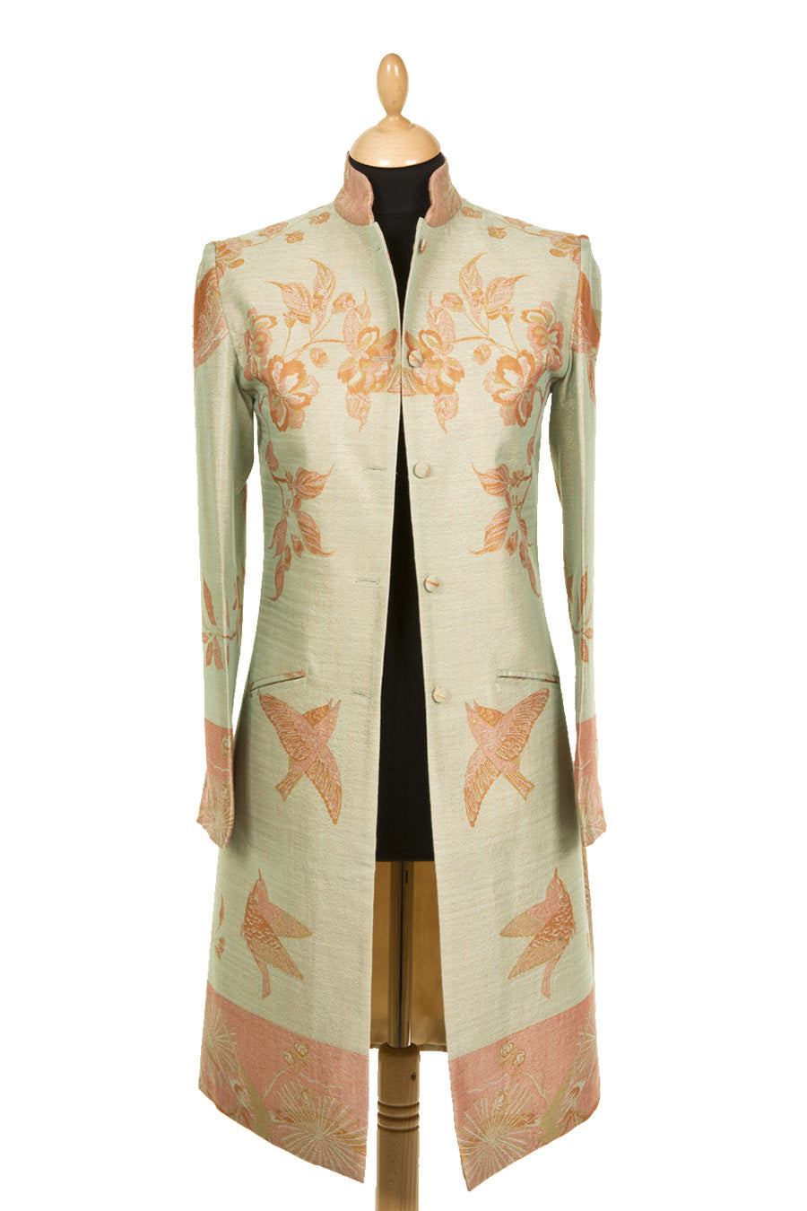 Floral and birds pattern coat with high collar. Knee length coat with buttons and pockets. 