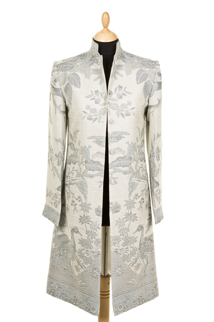 Grey floral coat with high collar. Mid length coat idea for wedding guest. 