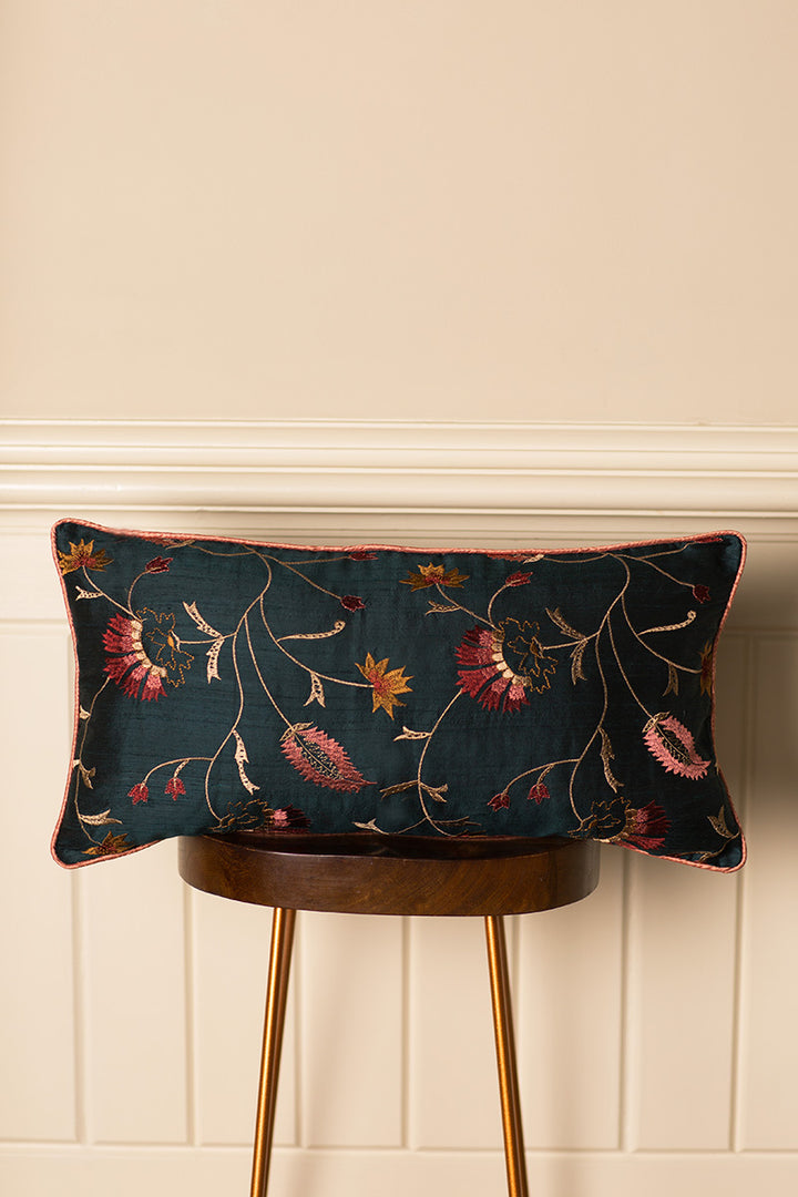 Shibumi rectangular sofa cushion in dark green with embroidered flower pattern. 