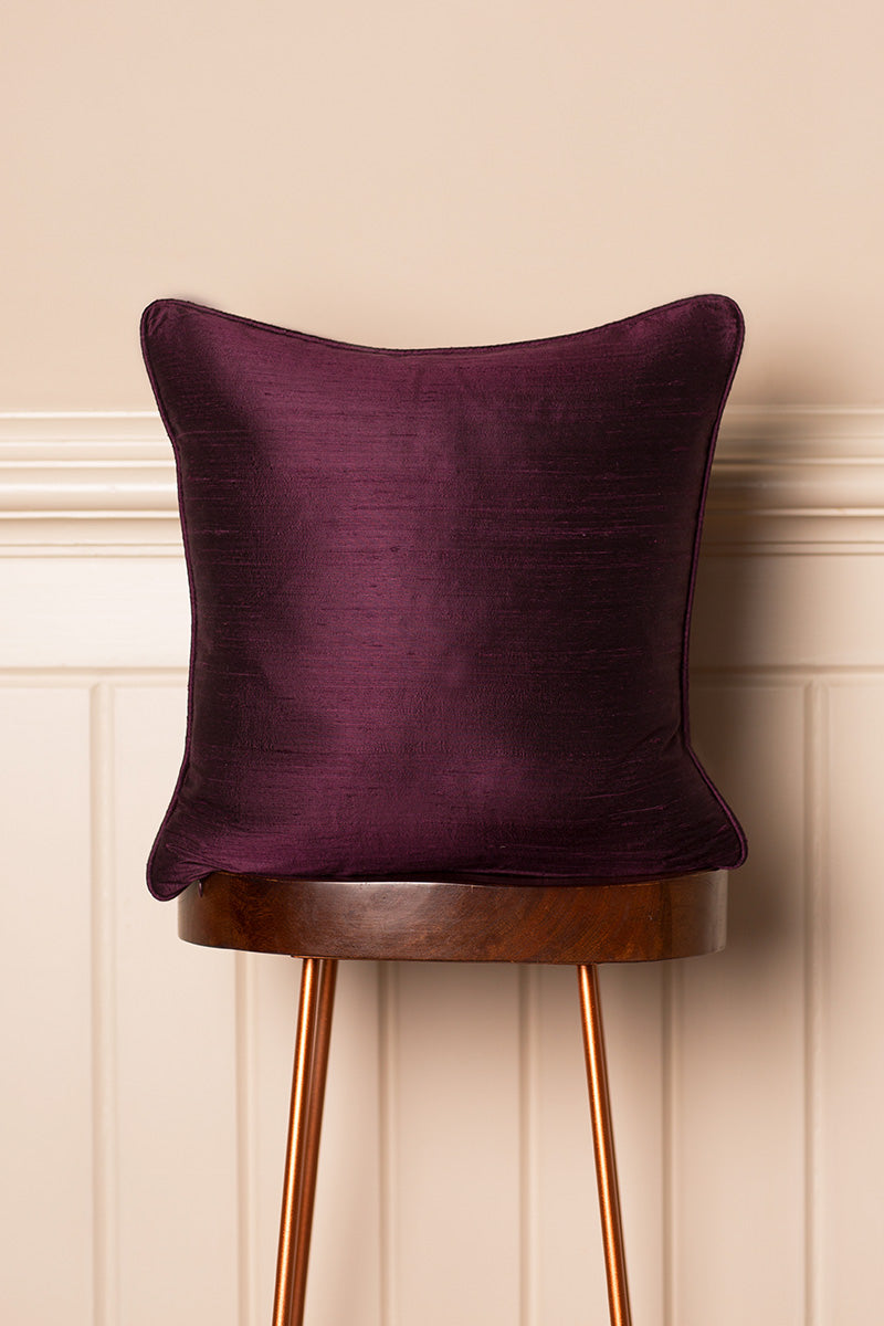 Purple sofa cushion made from raw silk. 