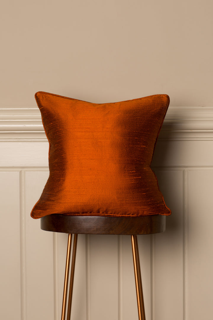 Silk Orange cushion in medium size.