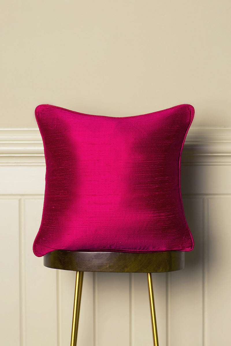 Bright pink sofa cushion