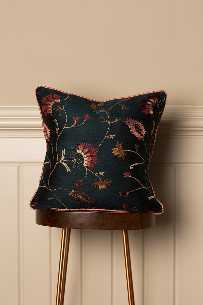 Embroidered silk cushion in dark green with red embroidery