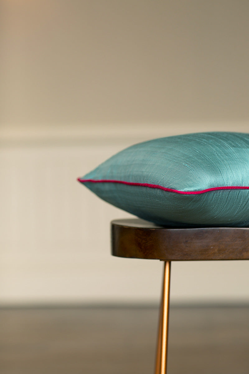 Light blue raw silk cushions. 