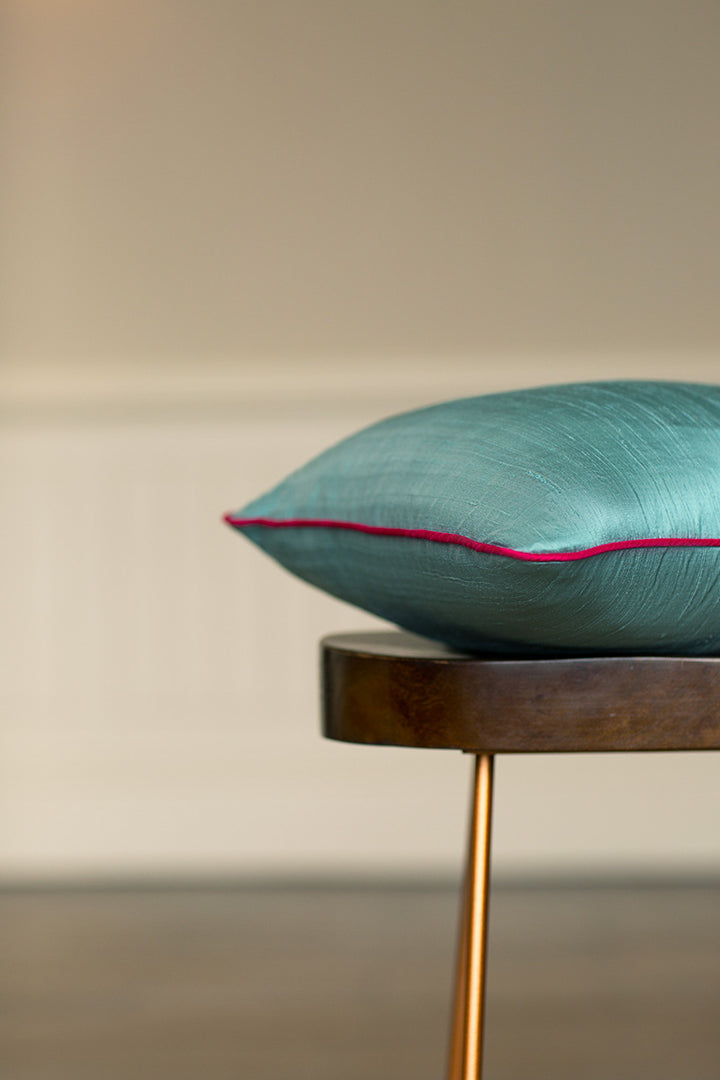 Light blue raw silk cushions. 