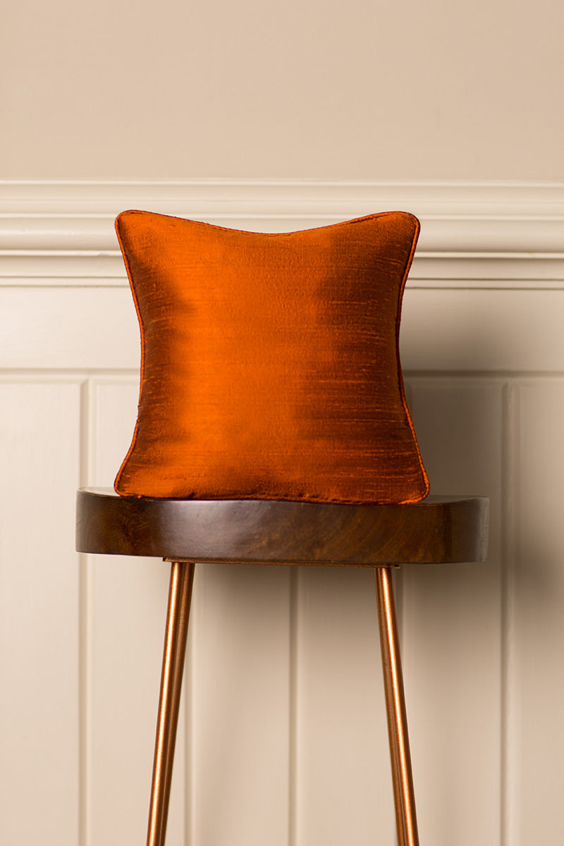 Small Orange cushion for armchair. 