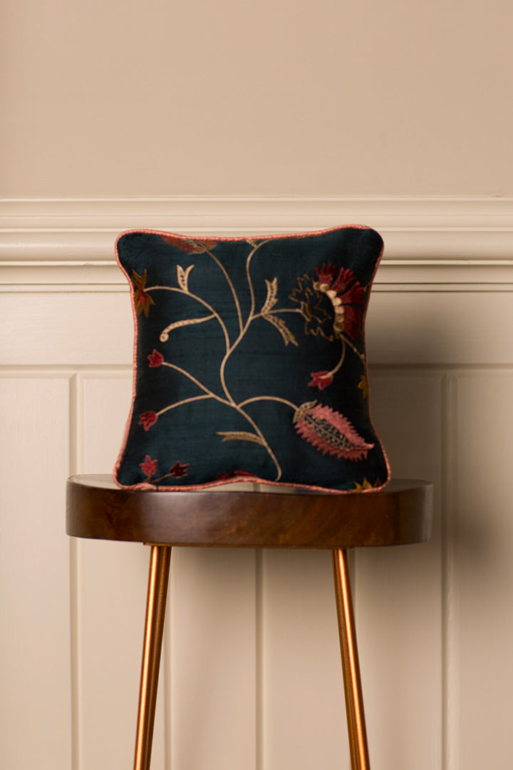 Small silk cushion in dark green with floral motif. Embroidered silk armchair cushion. 