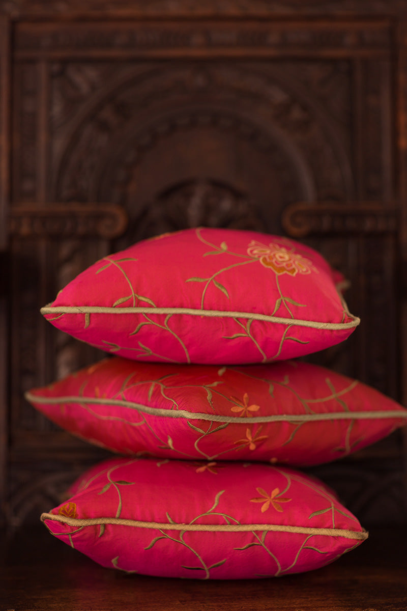 Small silk cushion sets. Red sofa cushions with golden flowers. 