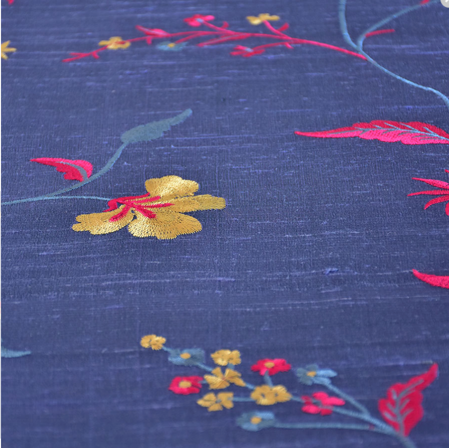 Embroidered silk fabric in blue