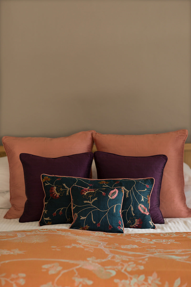 Silk bed cushion set. Colourful selection of luxury sofa cushions. 