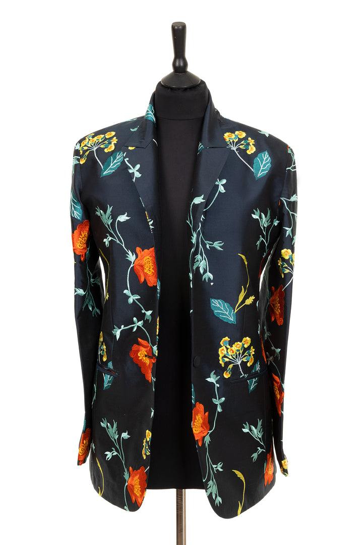 Dark blue silk jacket with bright floral pattern. Straight cut women's jacket. 