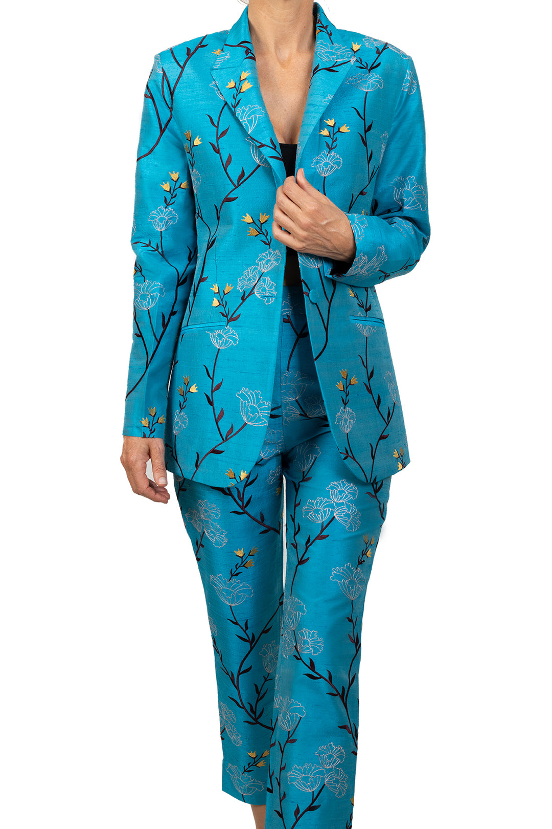 Mother of the groom suit in blue with floral pattern. Elegant women's suit. 