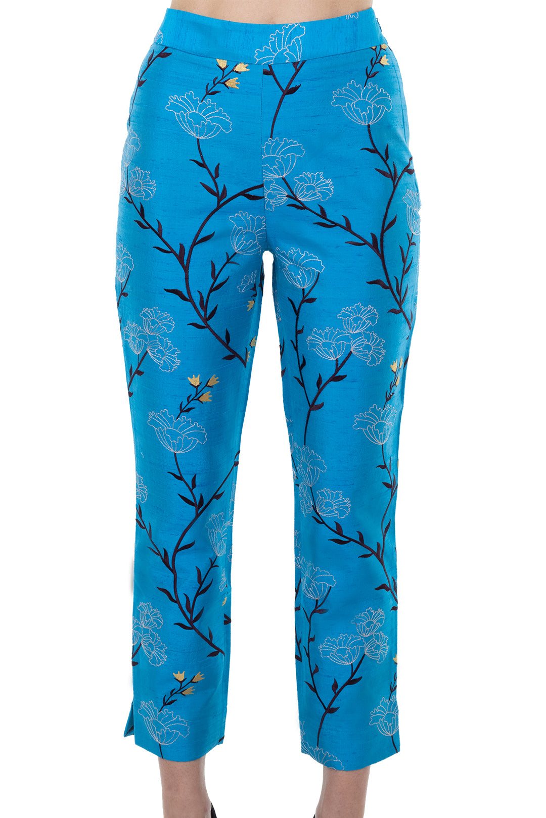 Turquoise straight leg trousers with floral pattern. Elegant wedding guest trousers. 