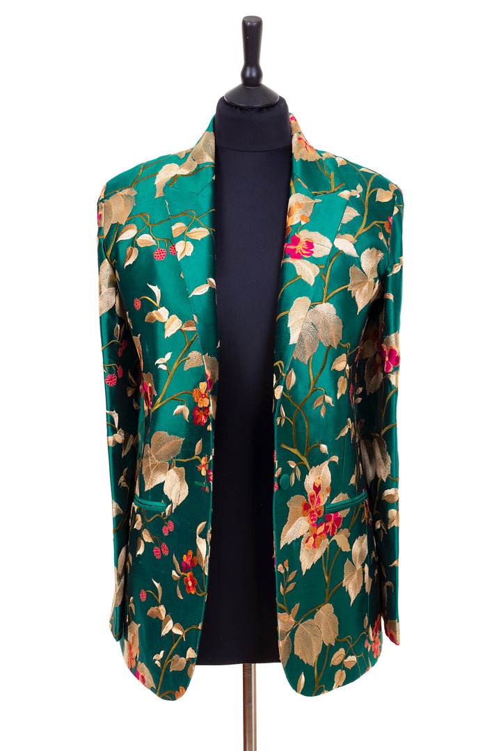 Dark green jacket for women with big flowers in yellow and red. 