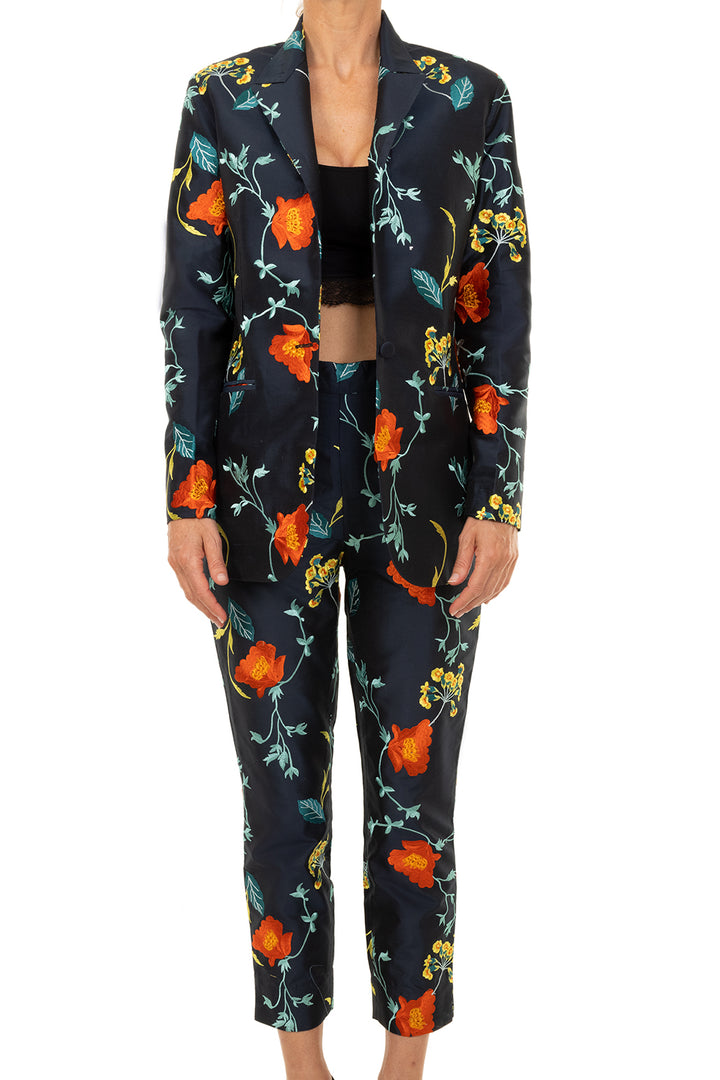 Dark blue floral suit. Classic blazer with matching straight leg trousers for women. 