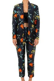 Floral suit with matching trousers and jacket. Silk embroidery with blue orange and yellow floral pattern. 