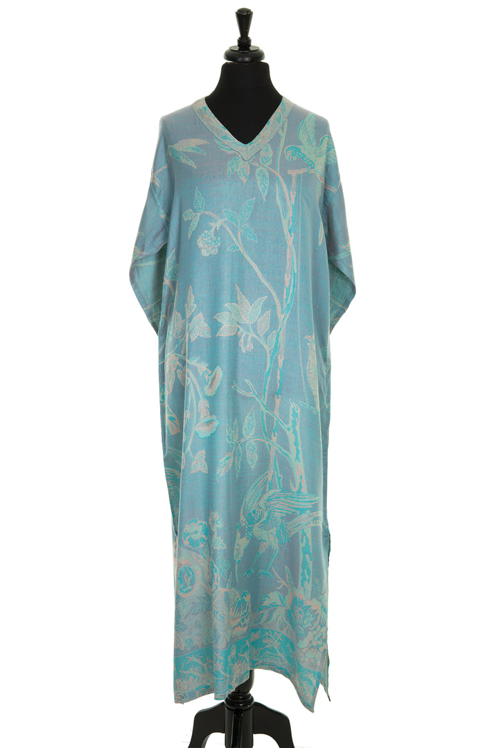 Long summer dress in blue. Luxury fabric summer dress in cashmere. Blue dress with floral pattern. 